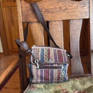 Fossil Tan and Purple Crossbody Bag with Adjustable Strap and Compact Design